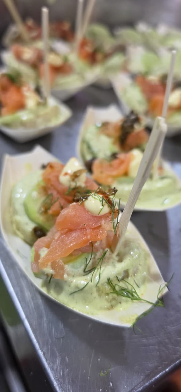 Smoked salmon and avocado mousse canapés with dill and capers