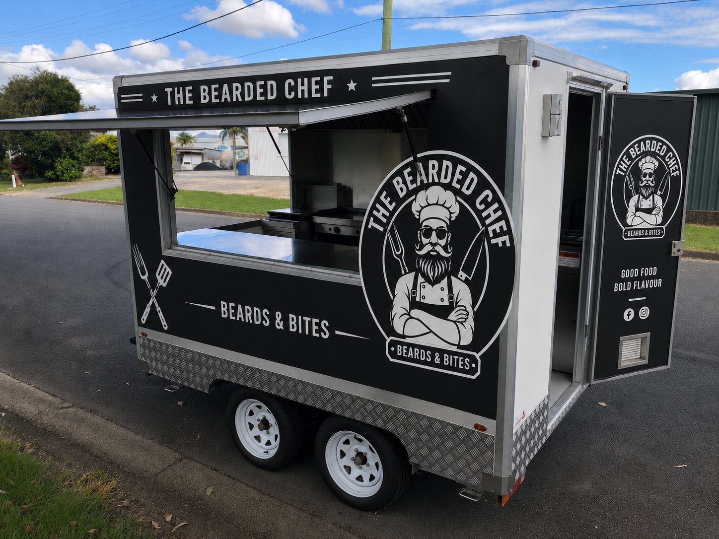 The Bearded Chef fully wrapped mobile kitchen trailer with the serving hatch open